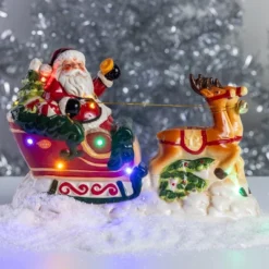 Transpac Dolomite Santa With Sleigh Music LED Figurine Multicolored Ceramic Christmas Tabletop Battery Operated Indoor Decor